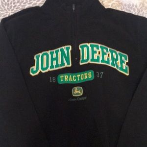 A John Deere black jacket.